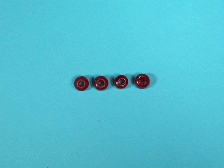 9mm Crow Beads: Translucent Red (kg) glass beads